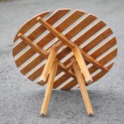 Vintage coffee table, wooden table with central handle, interior decoration, terrace, patio