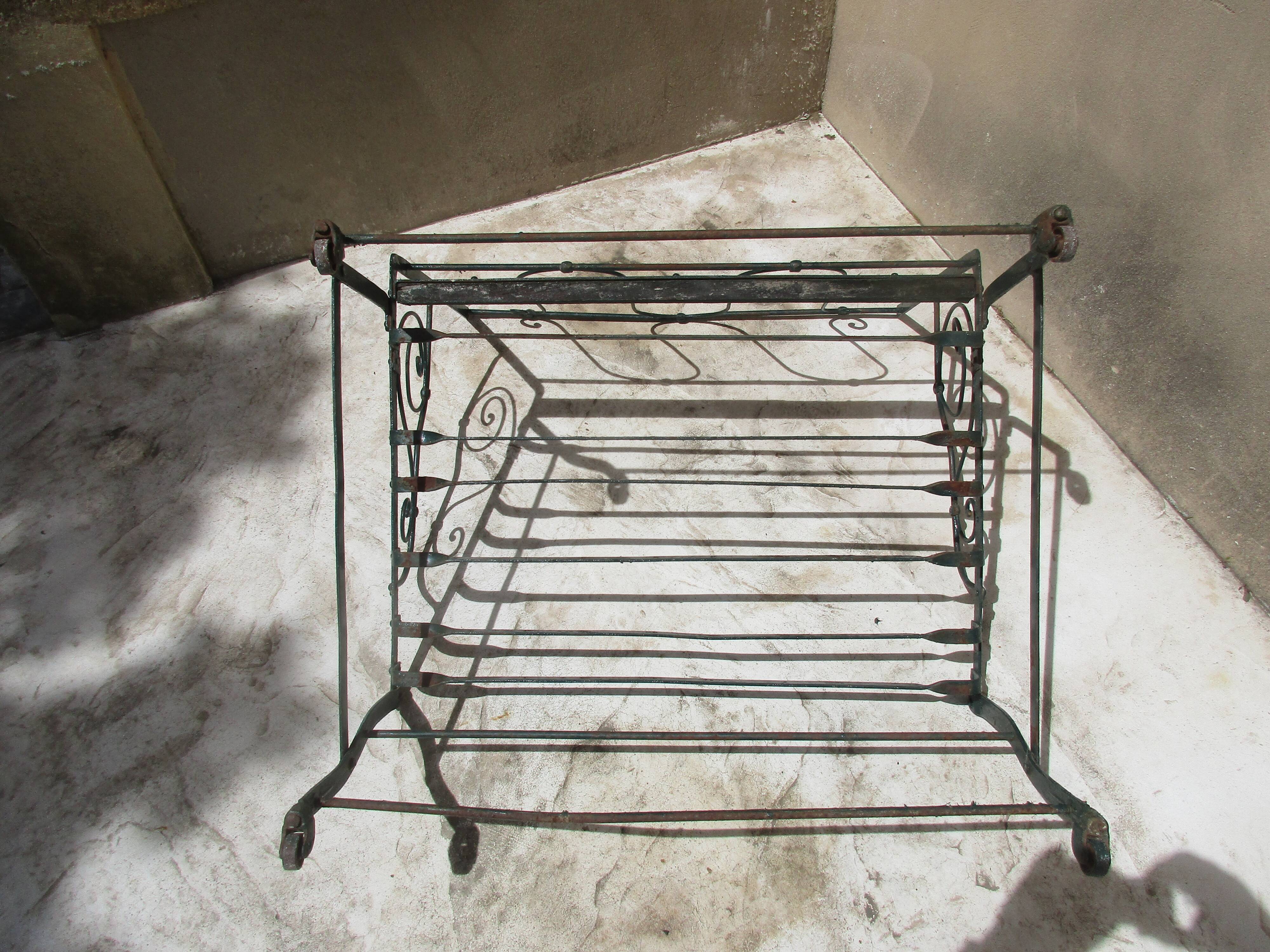 Pair of iron garden chairs forge