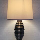 Art Deco metal lamp base with black and silver patina