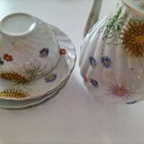 coffee pot, cup and saucers