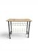 Vintage 1950s magazine table in metal and formica.