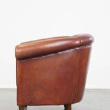 English style sheepskin club chair with a beautiful patina