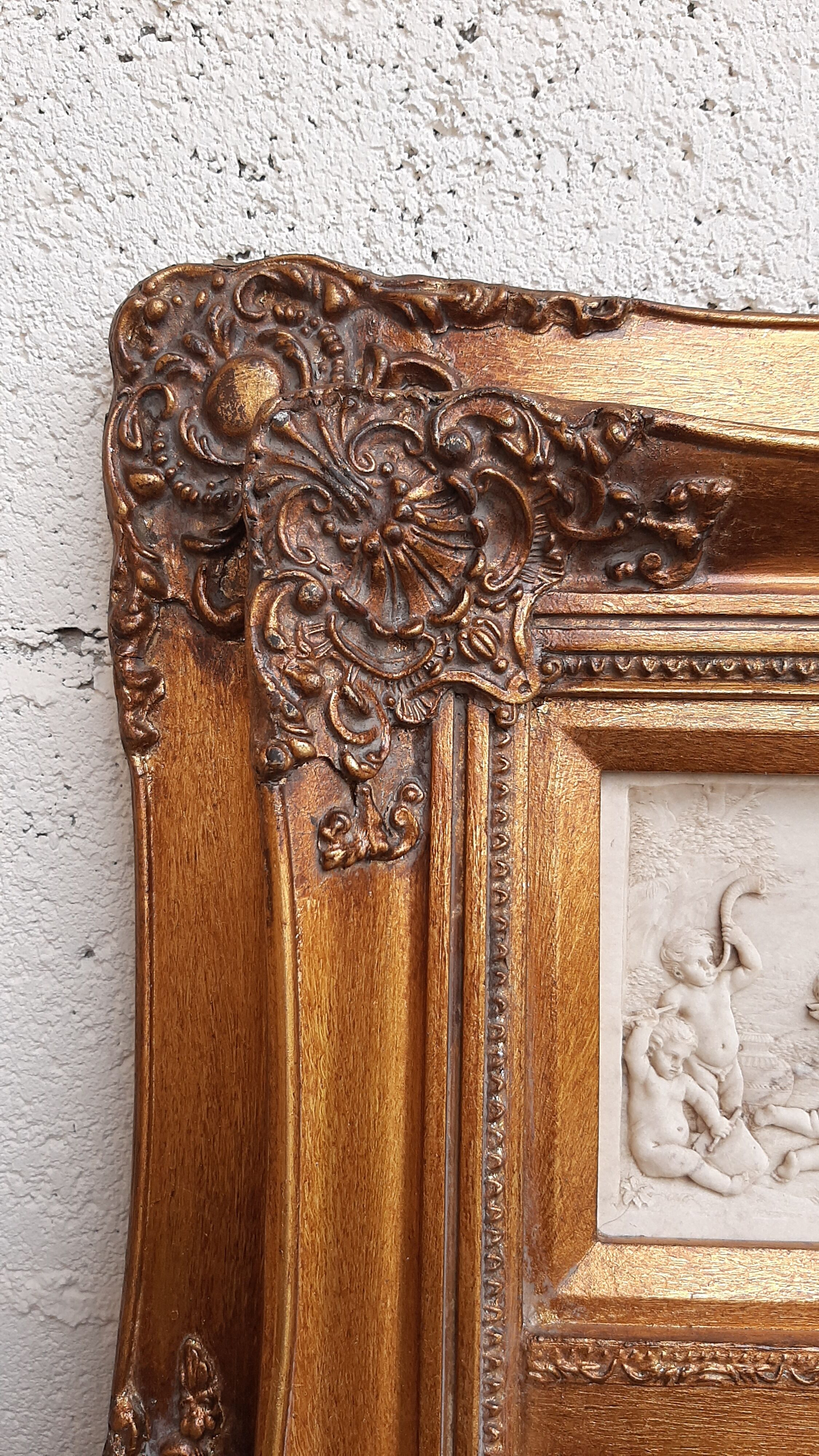 Trumeau miroir  dore biseaute 74 cm x 42 cm decor stuc