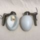 Pair of brushed steel appliques, half-egg opaline, 1970