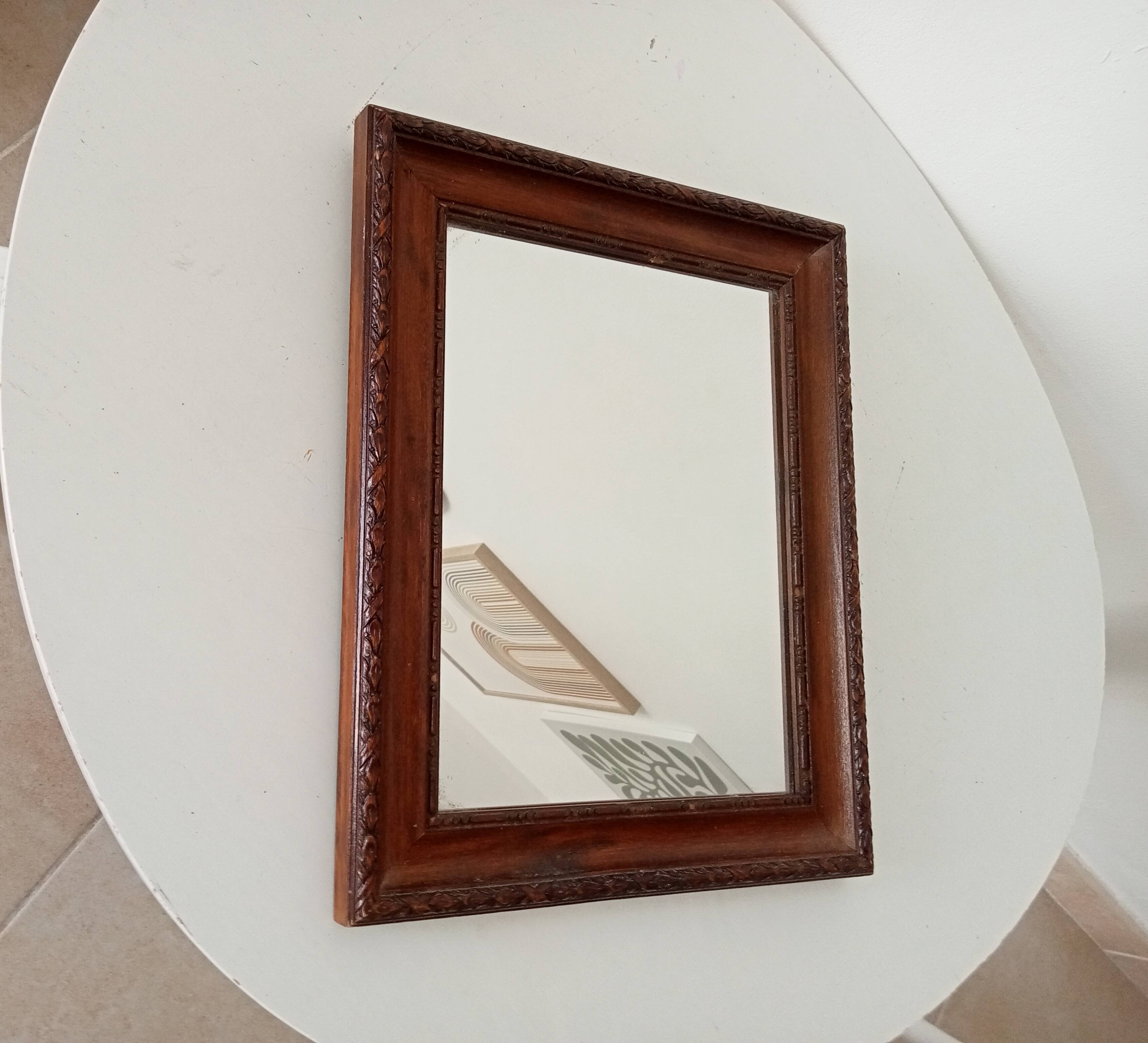 Antique carved wooden mirror from the 1940s/50s.