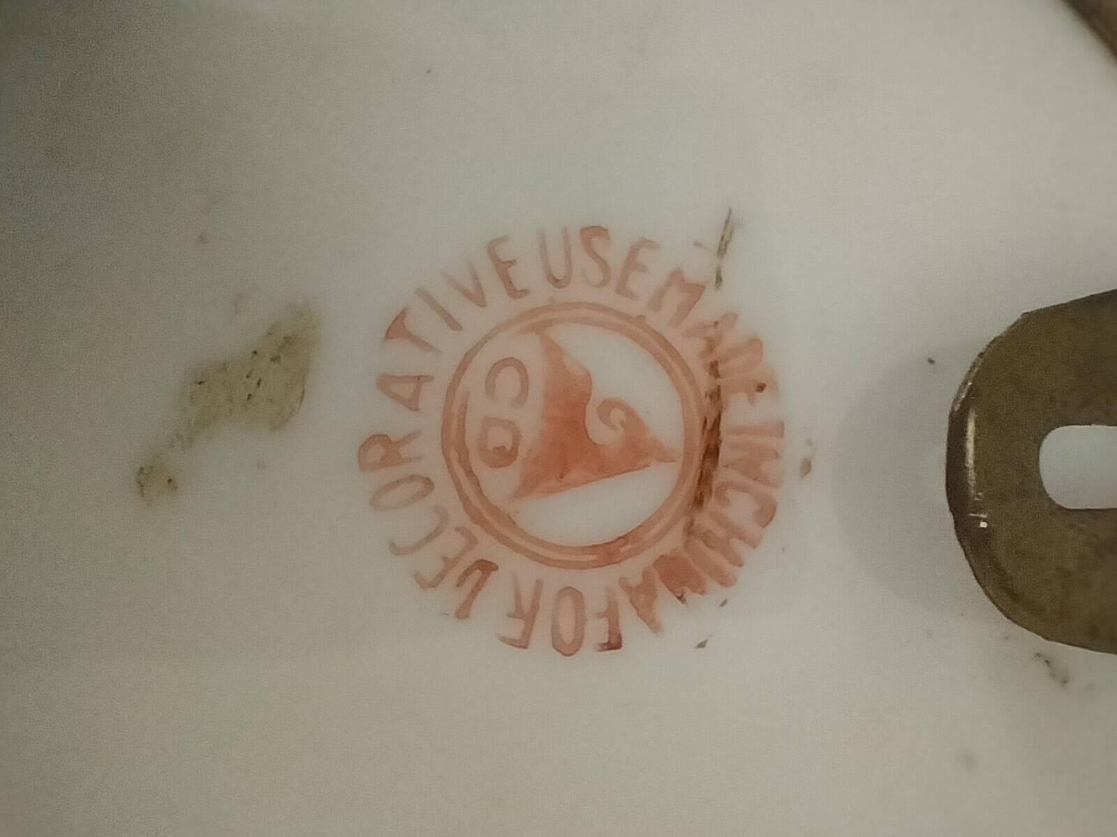 Pair of vintage Chinese decorative plates with floral decoration on a yellow background