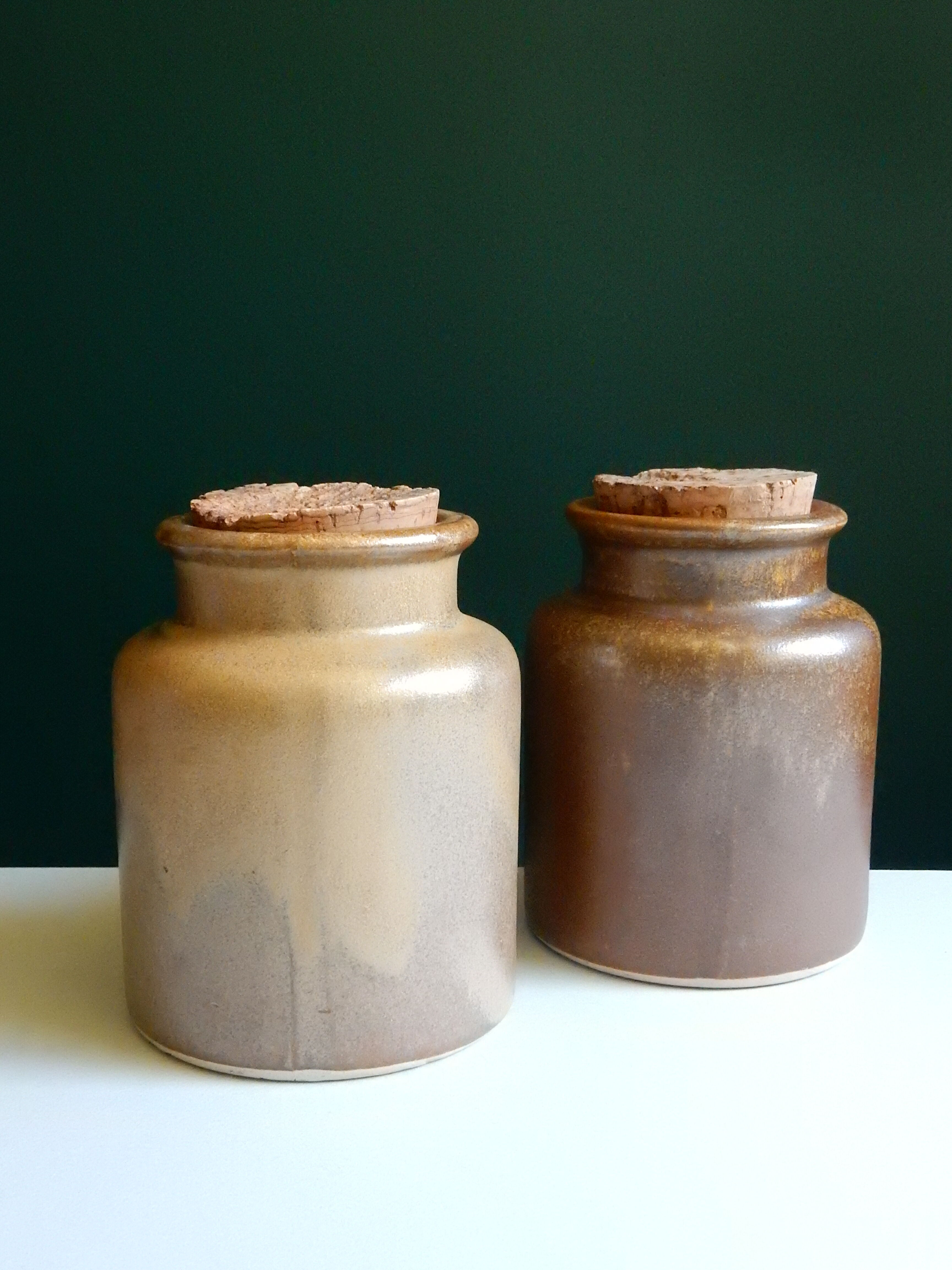 2 brown sandstone mustard pots