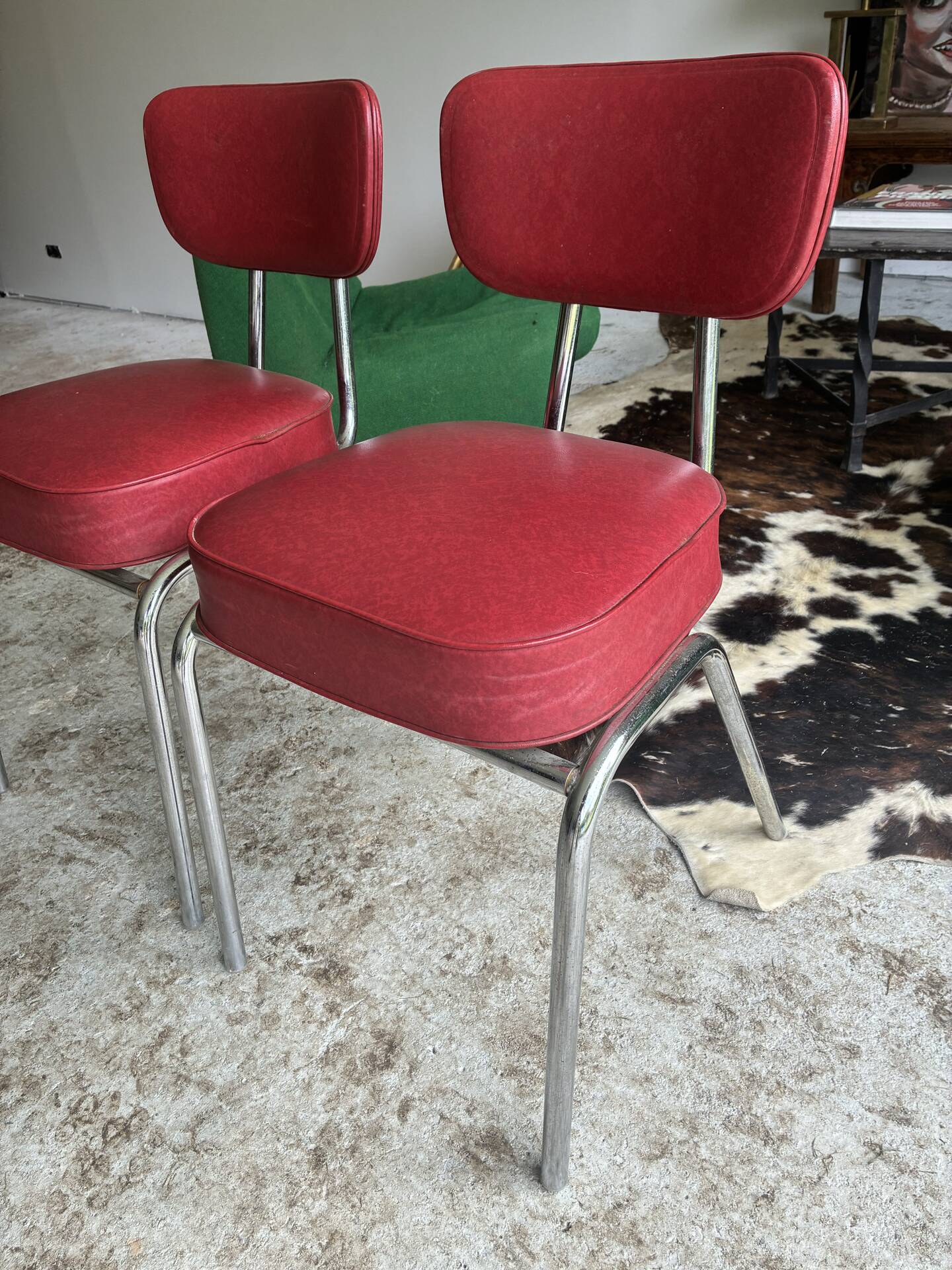 2 vintage red faux leather chairs