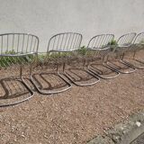 Set of 6 designer chairs in chromed metal from the 1970s