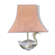 Old vintage lamp representing a duck in silver metal with wooden base