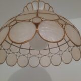 Mother-of-pearl and brass suspension