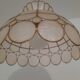 Mother-of-pearl and brass suspension