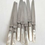 Antique table knives in mother-of-pearl and silver-plated metal