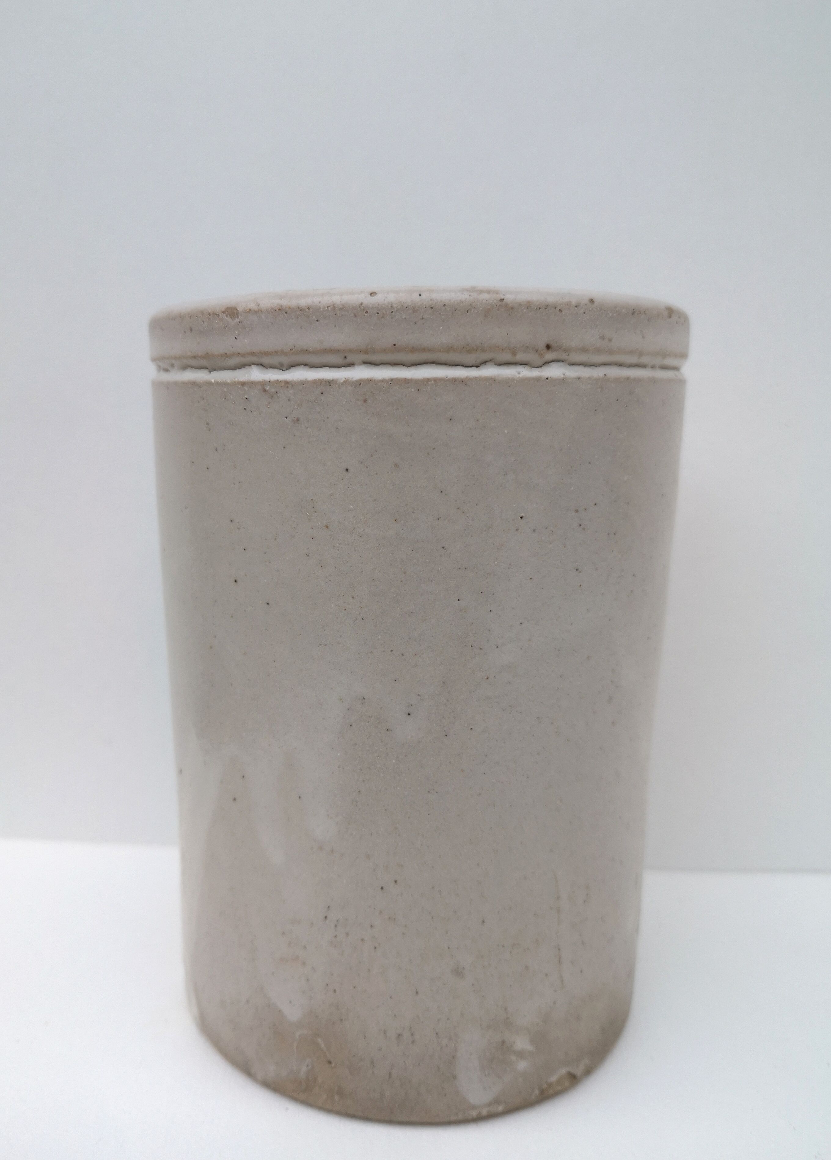 Old pot in glazed stoneware