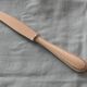Set of 12 cheese or fruit knives with silver metal handles.