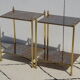 Pair of bedside tables in gilded brass and glass, midcentury