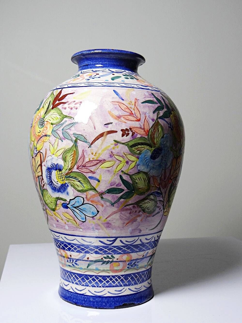 Vintage Portuguese vase in glazed terracotta with hand-painted floral decoration.