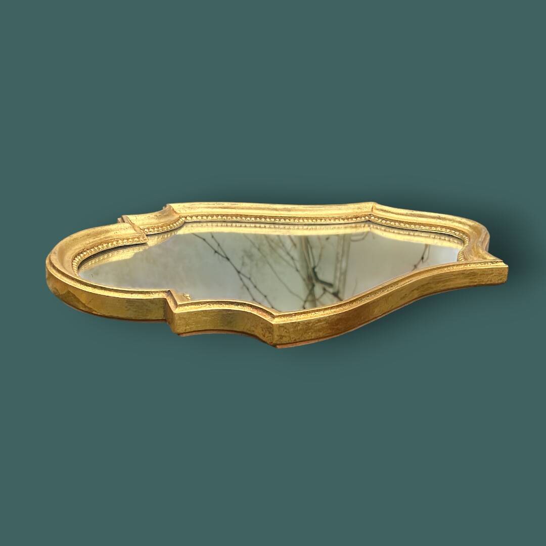 Antique mirror in gilded resin, shaped with curves – neoclassical style