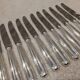 11 silver-plated metal lunch knives by Ravinet Coquille, 18cm