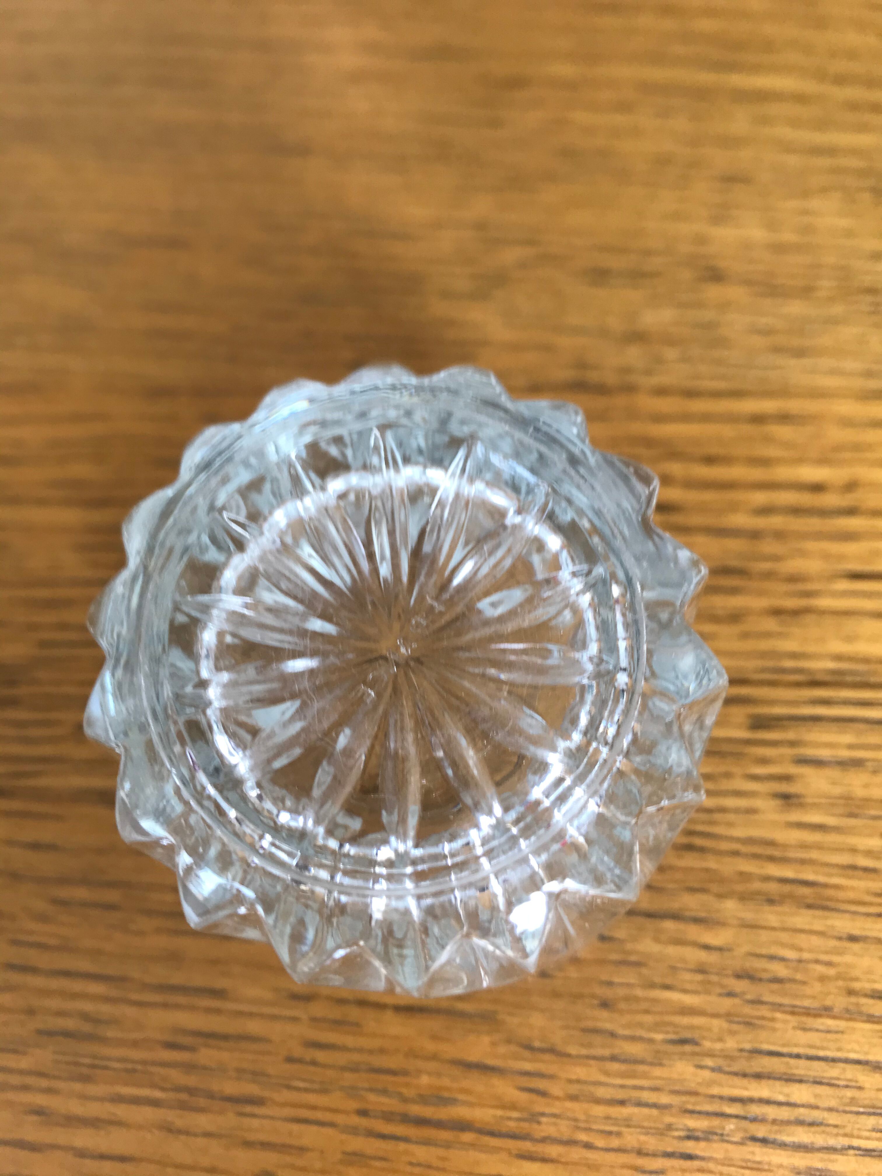 Mismatched decanter and whiskey glasses