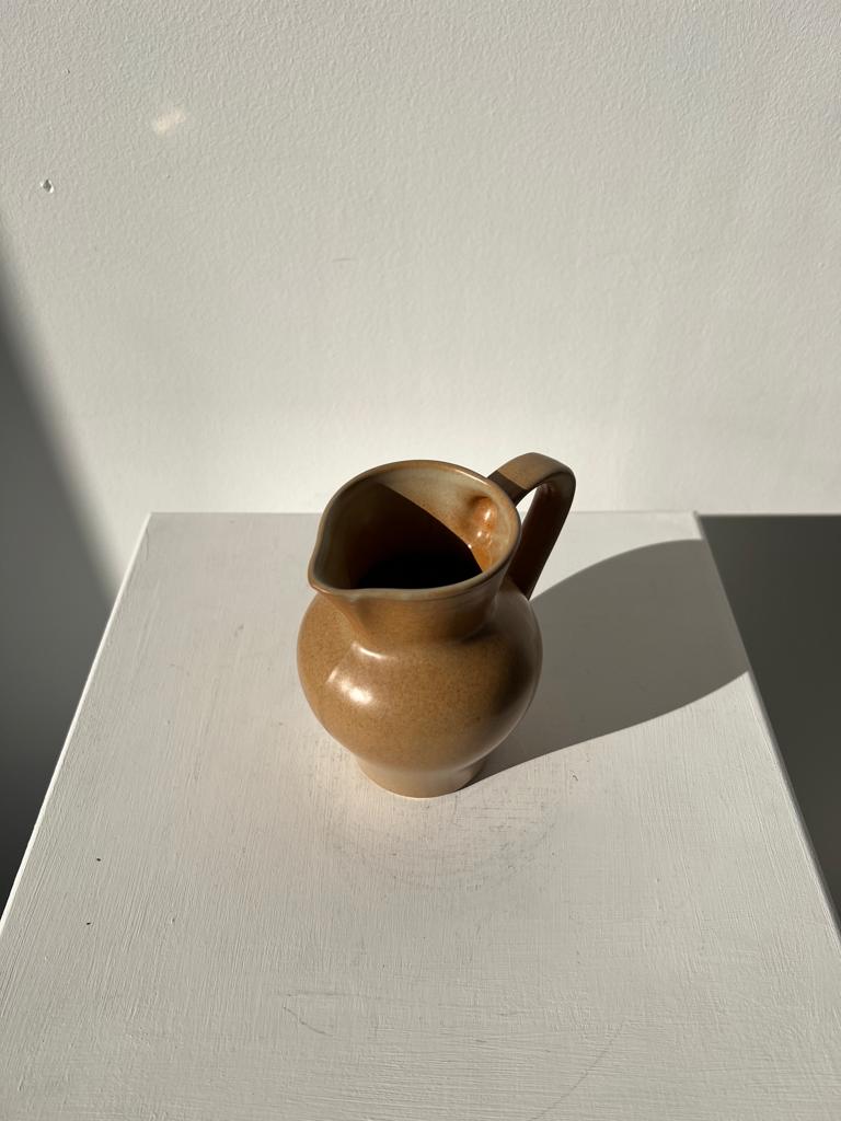 Pitcher in light beige sandstone