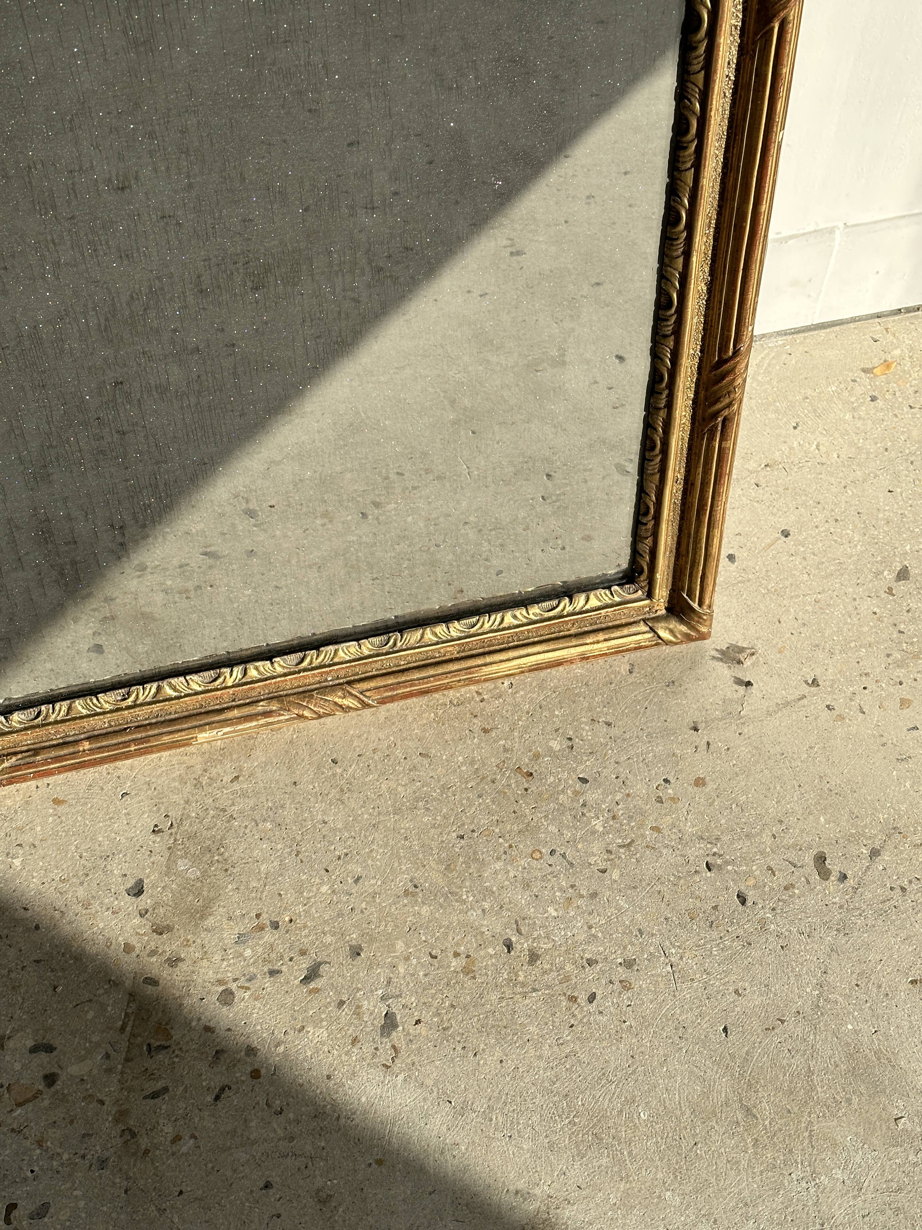 Large gilded mirror 19th century rounded corners mercury glass Louis XVI style