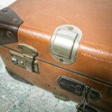 The cardboard suitcase