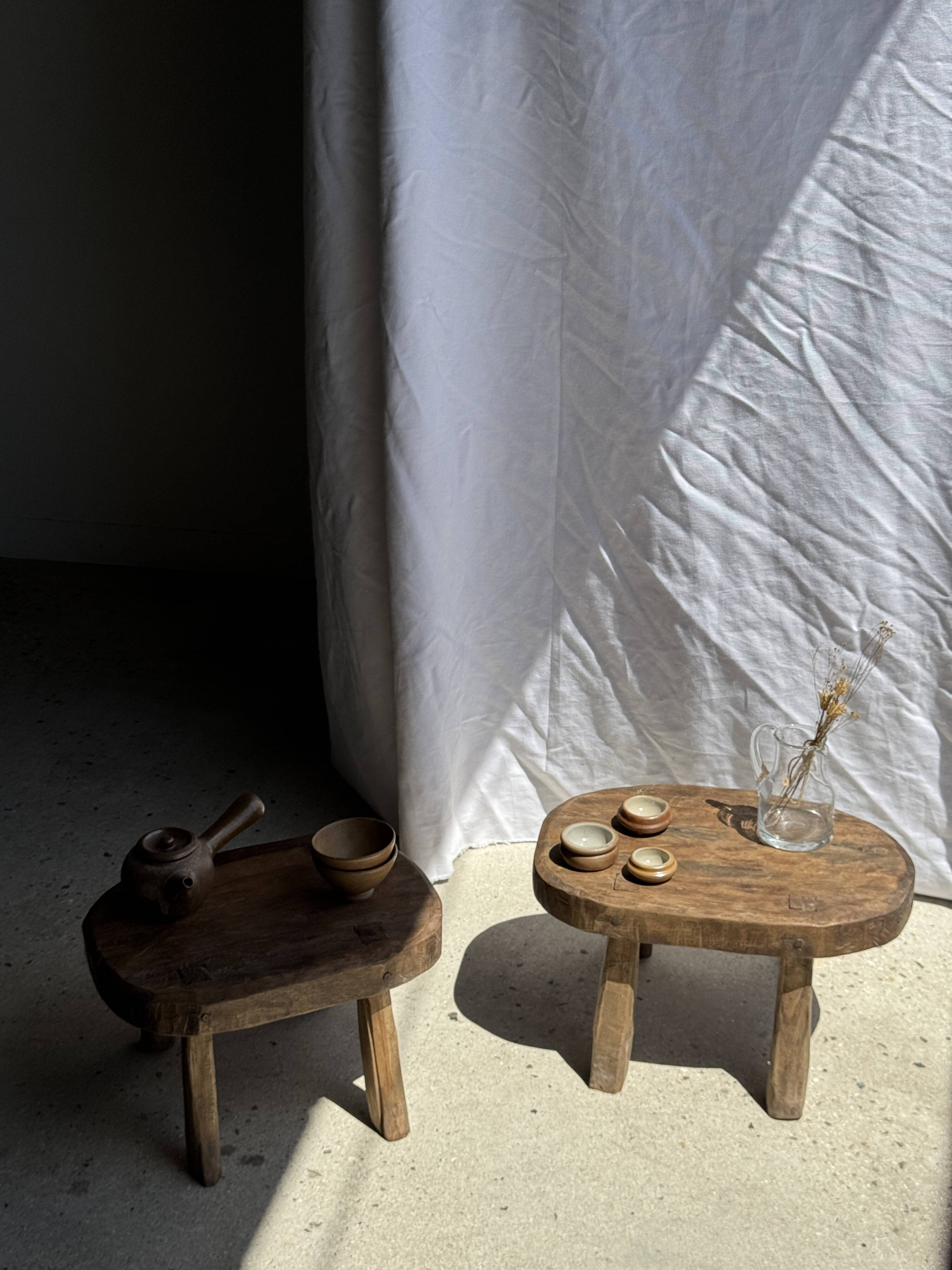 Small stool, oval solid teak accent stool with a two-tone seat.
