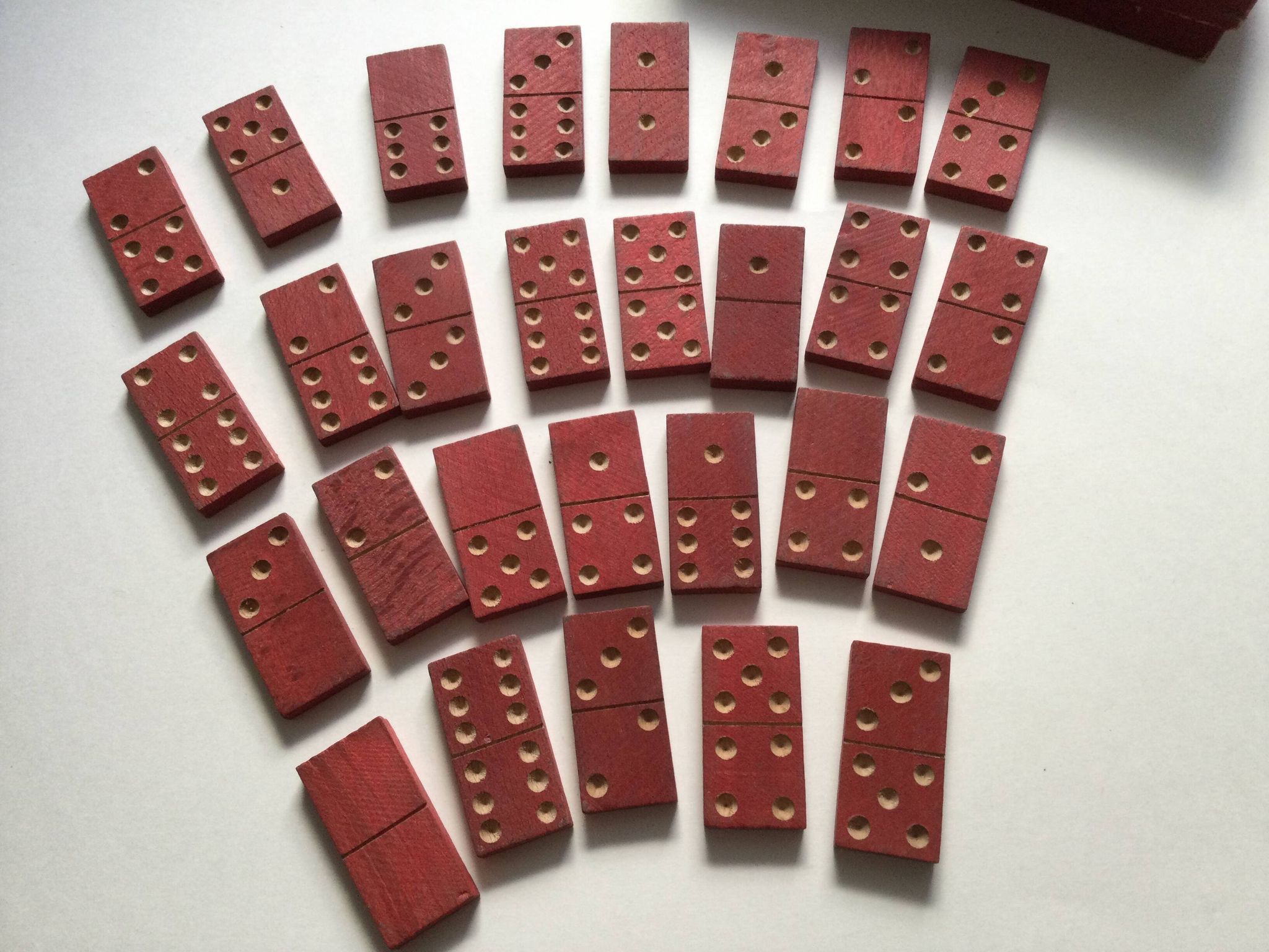 Red wooden dominoes game from the 50s old toy