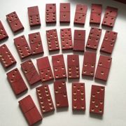 Red wooden dominoes game from the 50s old toy