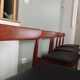 Four Danish mid-century teak armchairs.