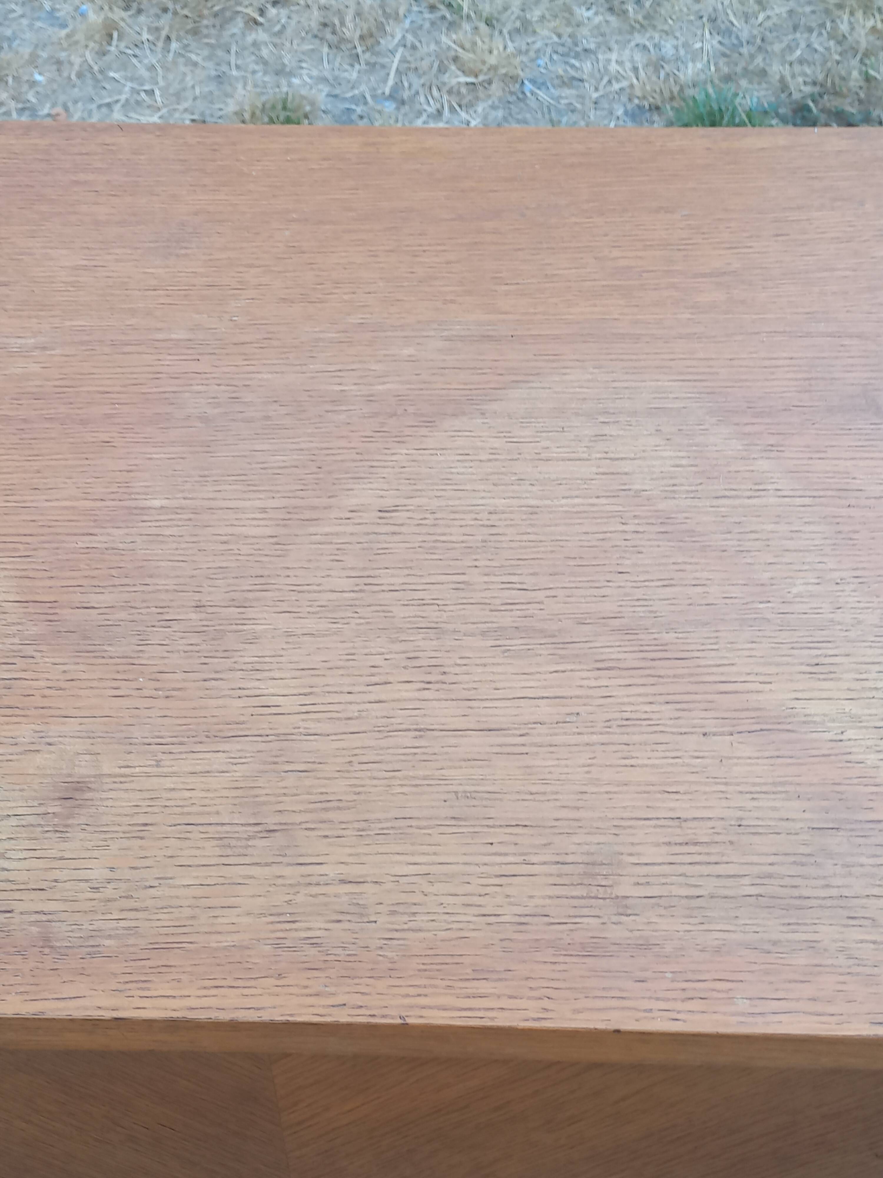 Commode vintage en chêne blond pieds compas 4 tiroirs 1950