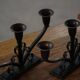 Early 20th century, pair of Danish Art Deco candlesticks in metal with three arms, 1930s.