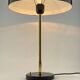 Rare black and gold UFO table lamp by Louis Kalff for Philips.