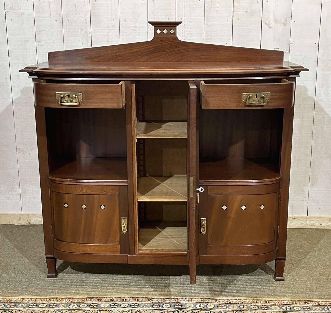 Mahogany sideboard from the Art Nouveau period in the style of Gustave Serrurier-Bovy.