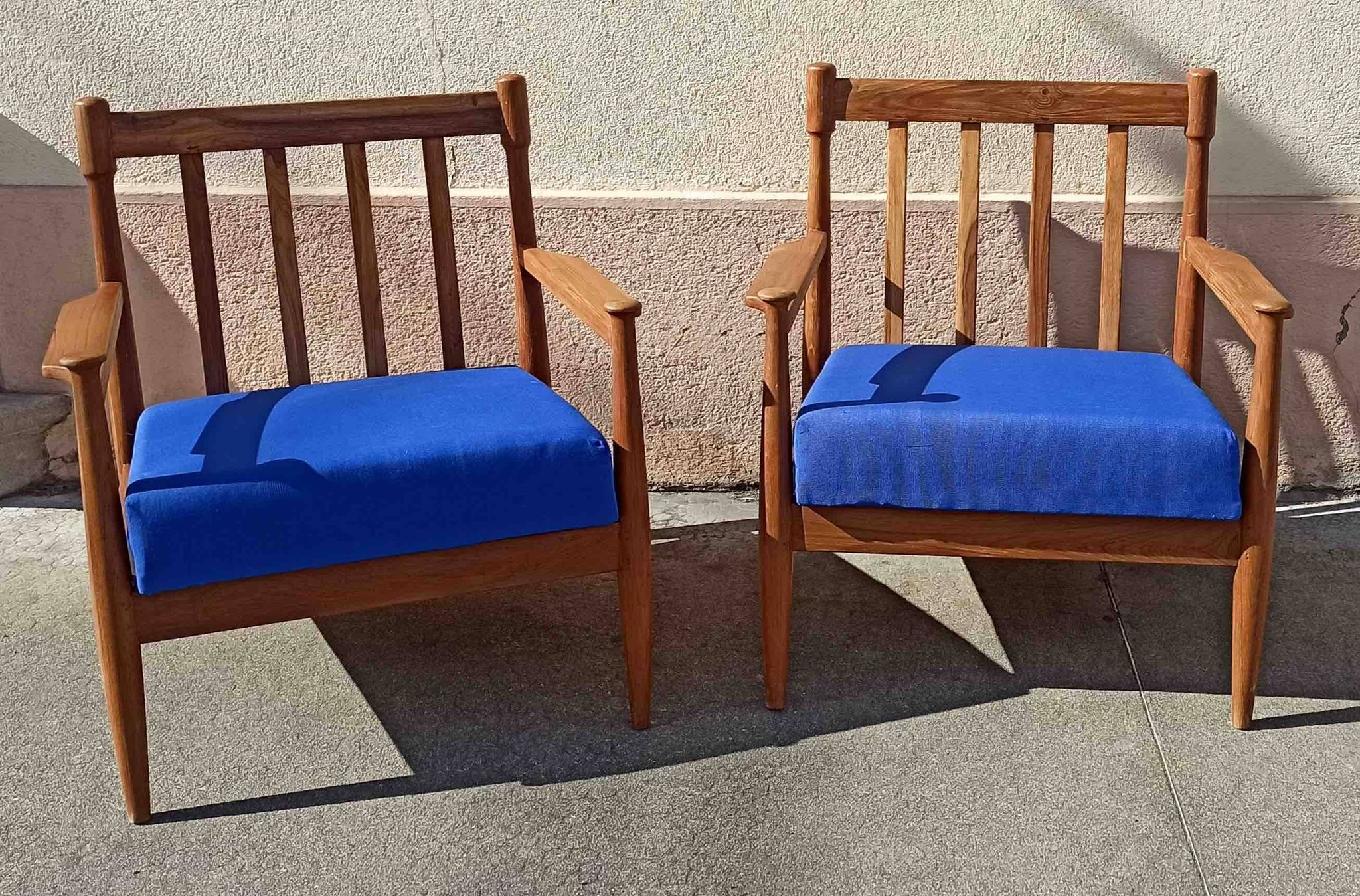 Pair of 1960s Scandinavian armchairs with blue cushions