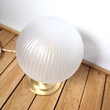 Vintage globe and brass table lamp