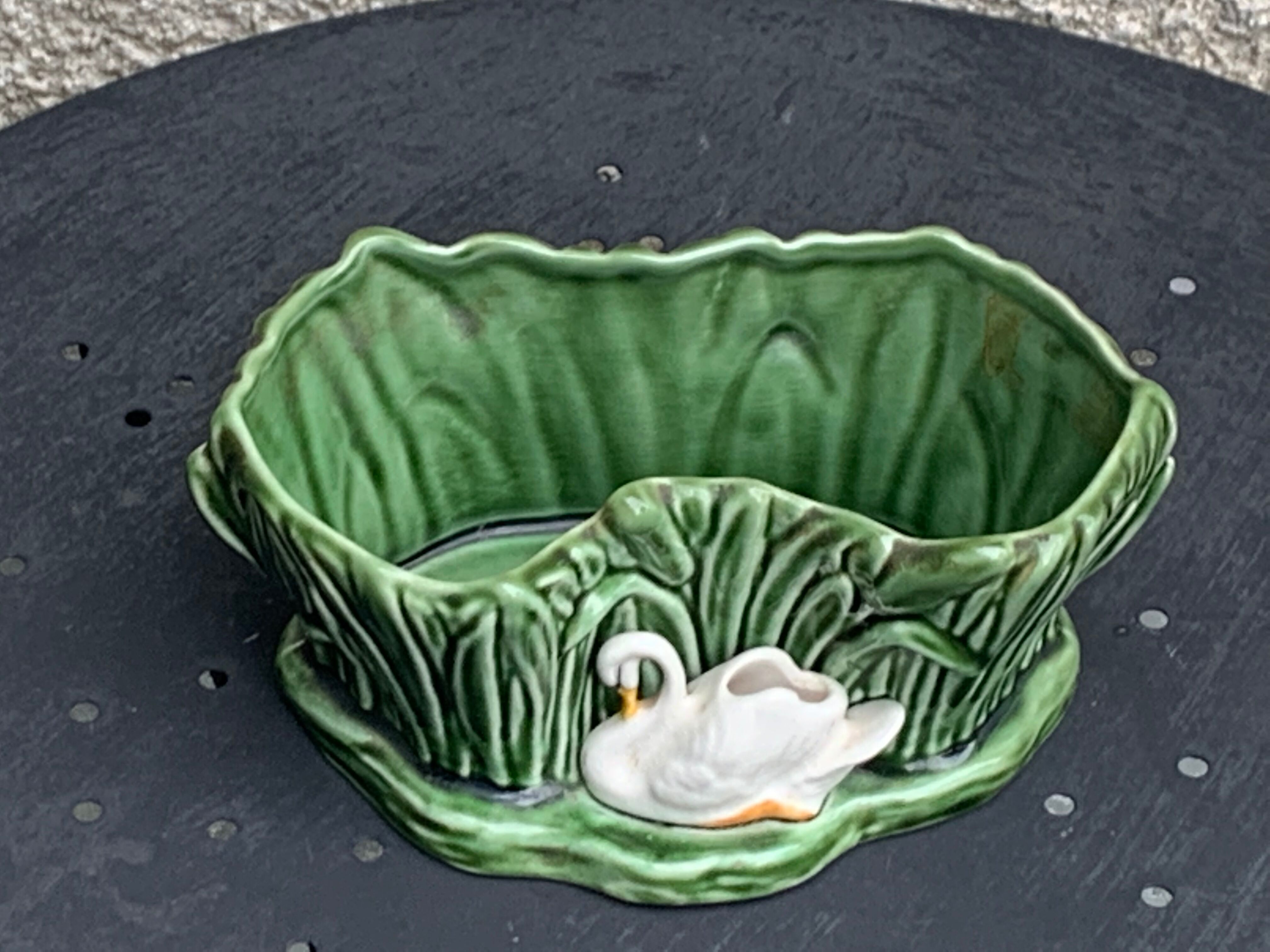 Pot cover in ceramic slurry glazed green pattern foliage and swan made in england numbered