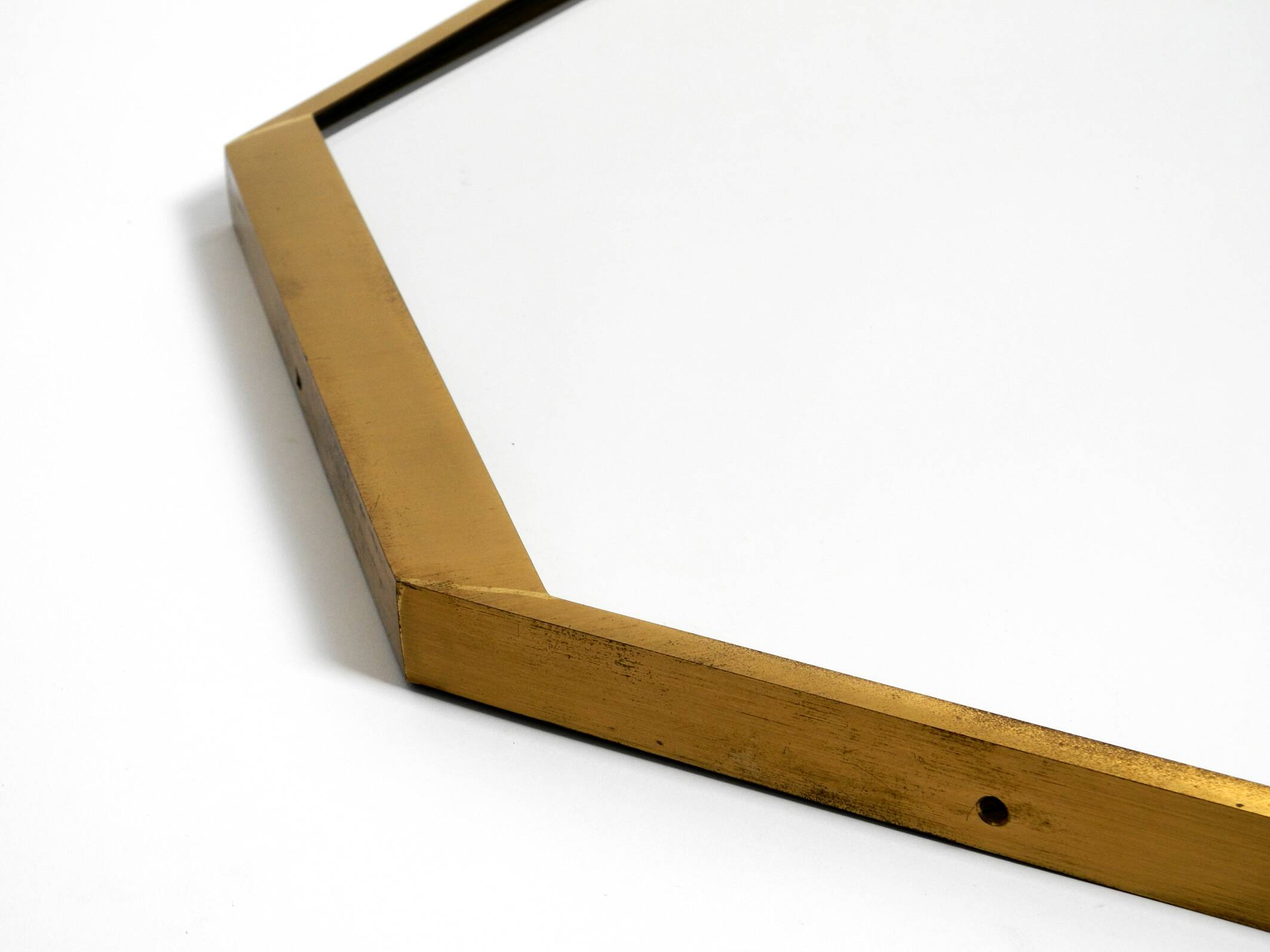 Large unusual Italian Mid Century Modern octagonal brass wall mirror