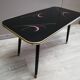 Table basse pieds compas plateau verre vintage 50/60