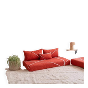 Handmade Moroccan floor cushion in orange cotton.