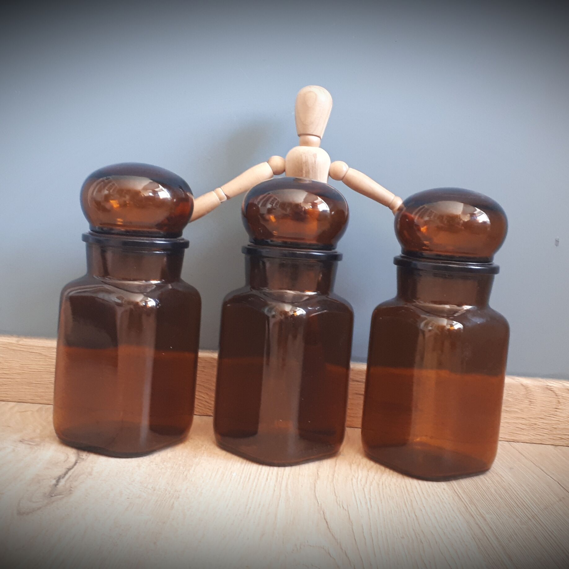Trio round brown apothecary bottles