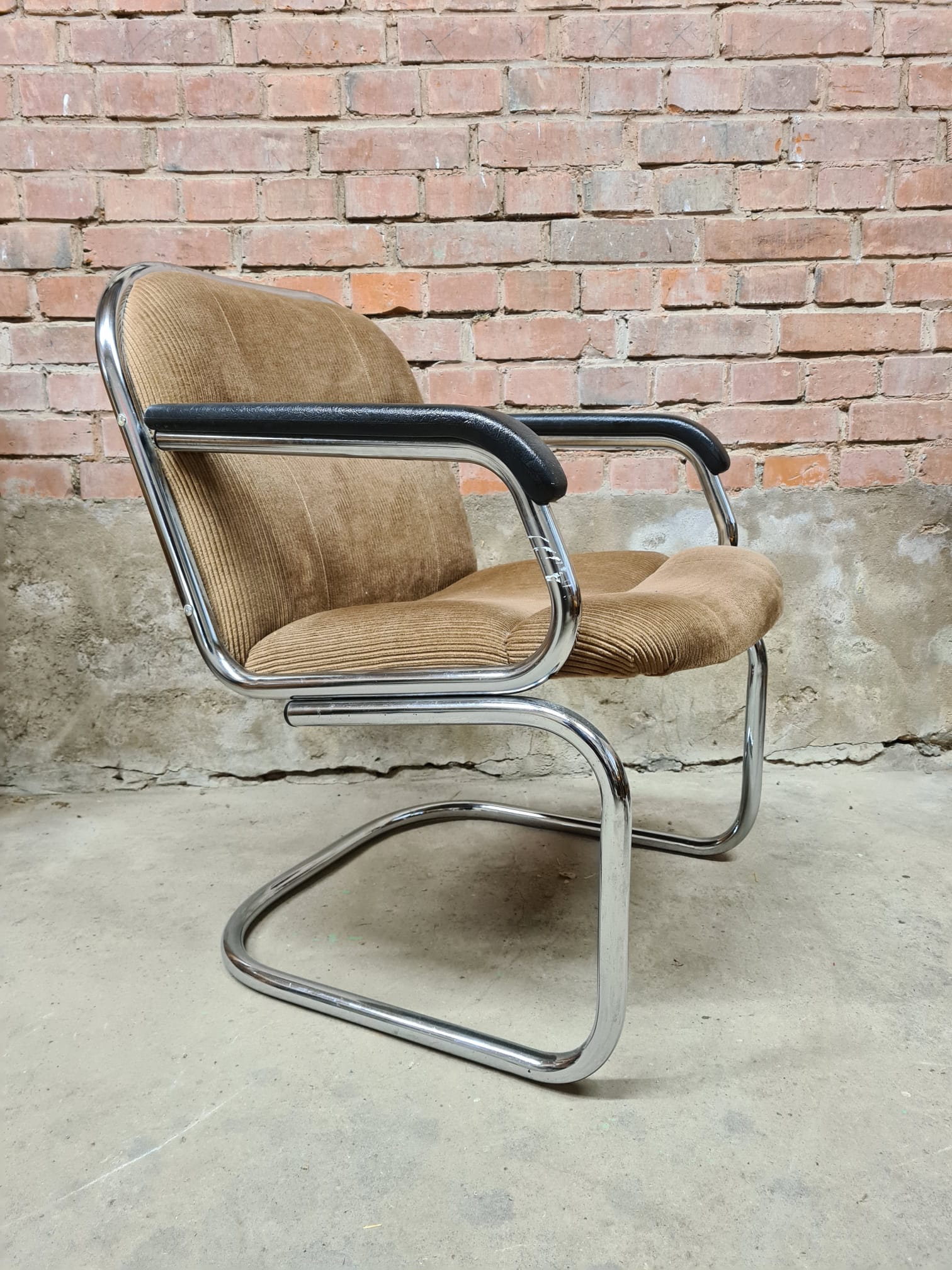 Vintage tubular ribbed office armchair