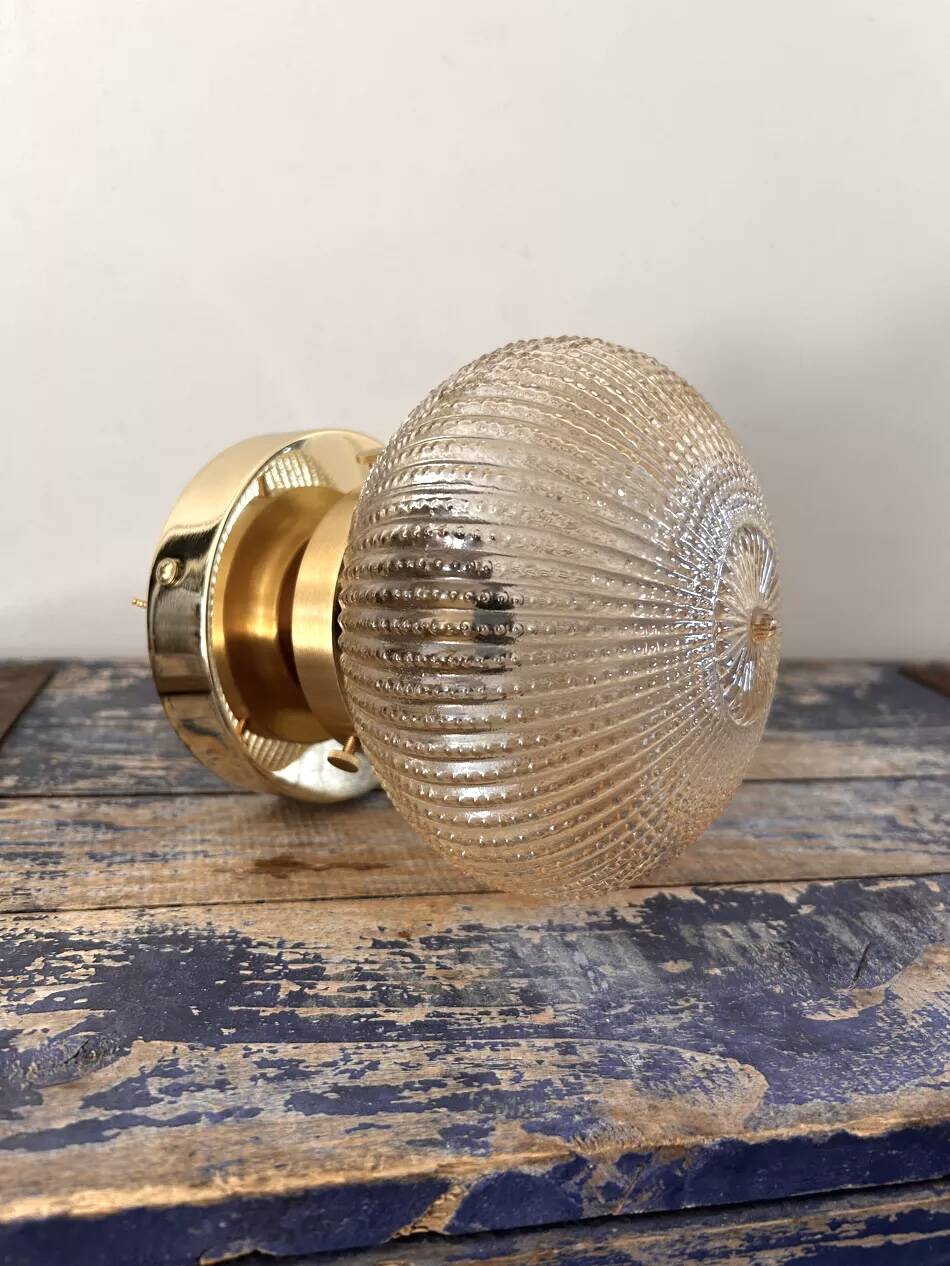 Golden globe wall light