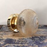 Golden globe wall light