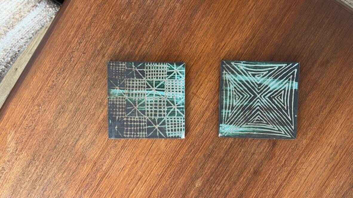 Pair of Robert Picault ceramic trivets with geometric patterns