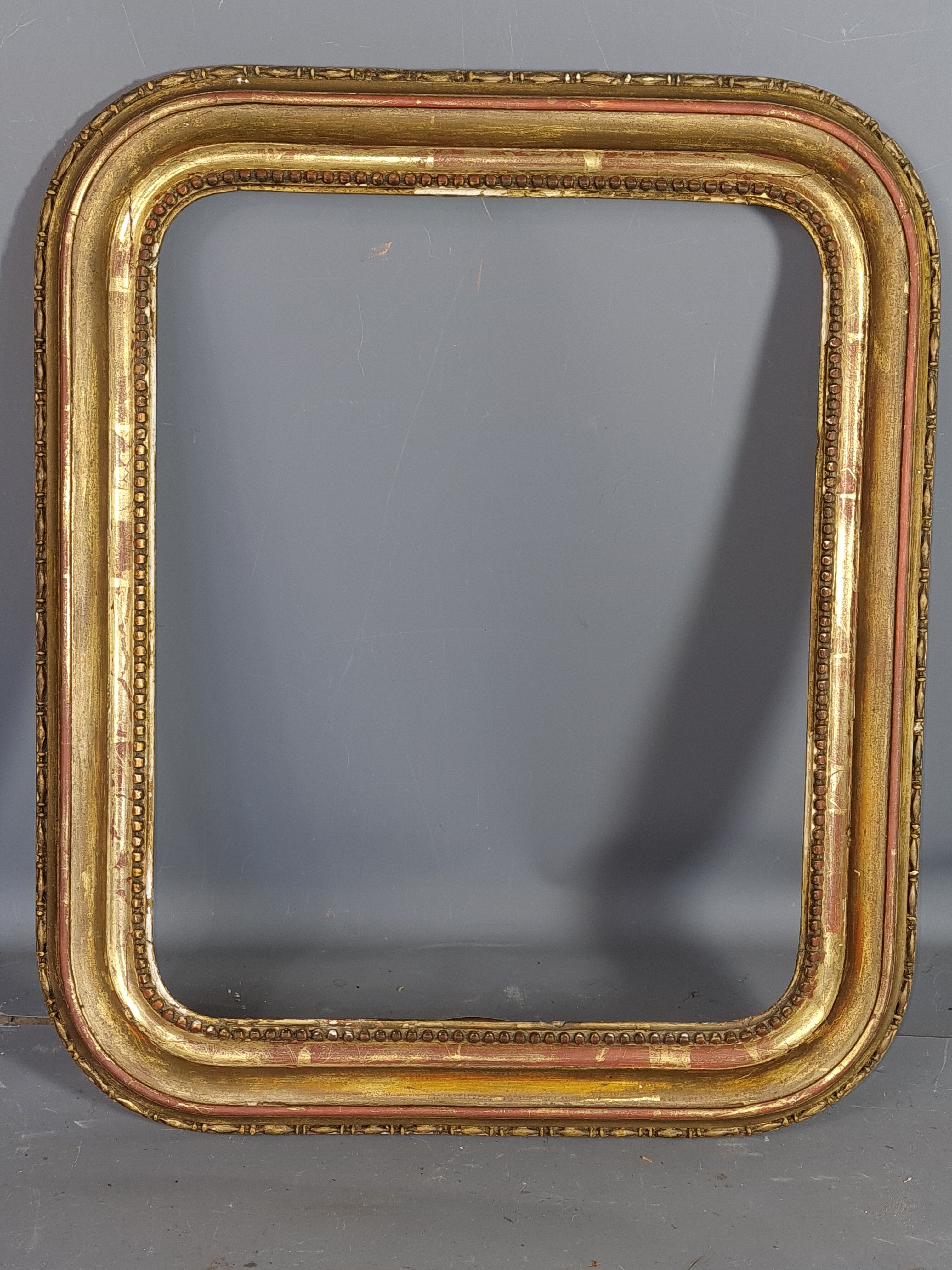 Old frame with doucine gilded stucco wood
