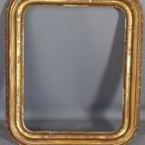 Old frame with doucine gilded stucco wood
