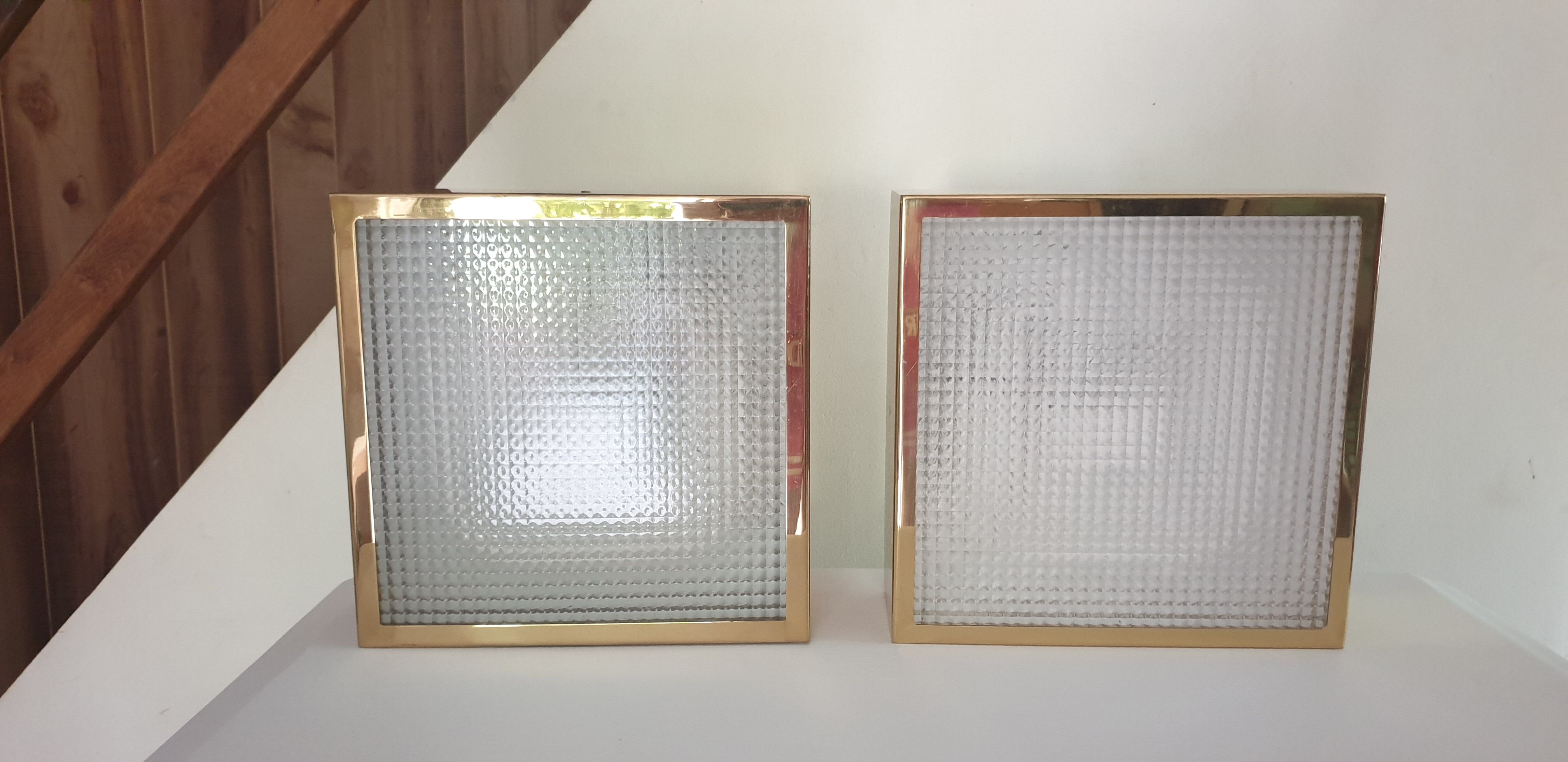 Pair of gold square wall light
