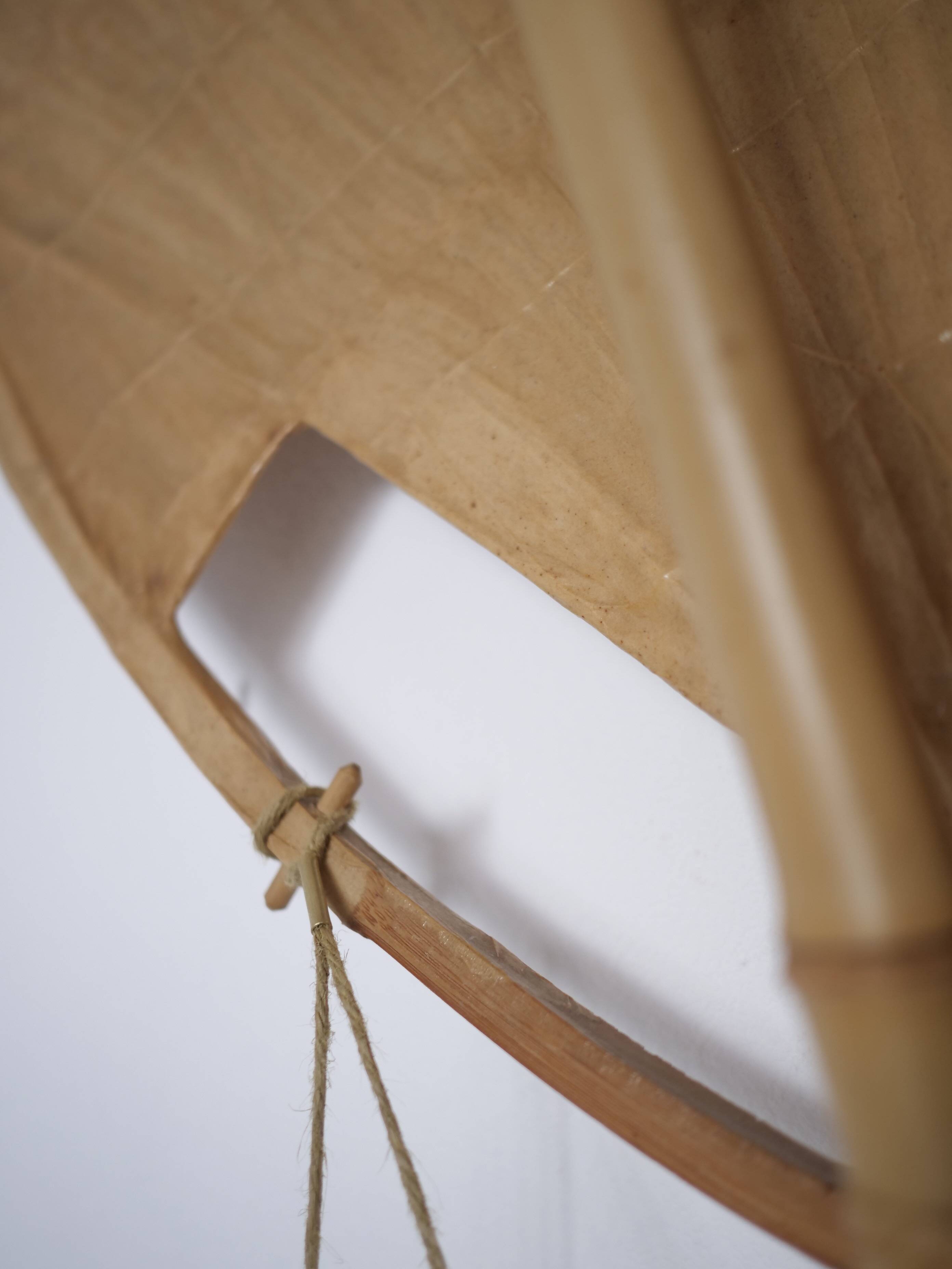 Large-format Uchiwa light fixture designed by Ingo Maurer